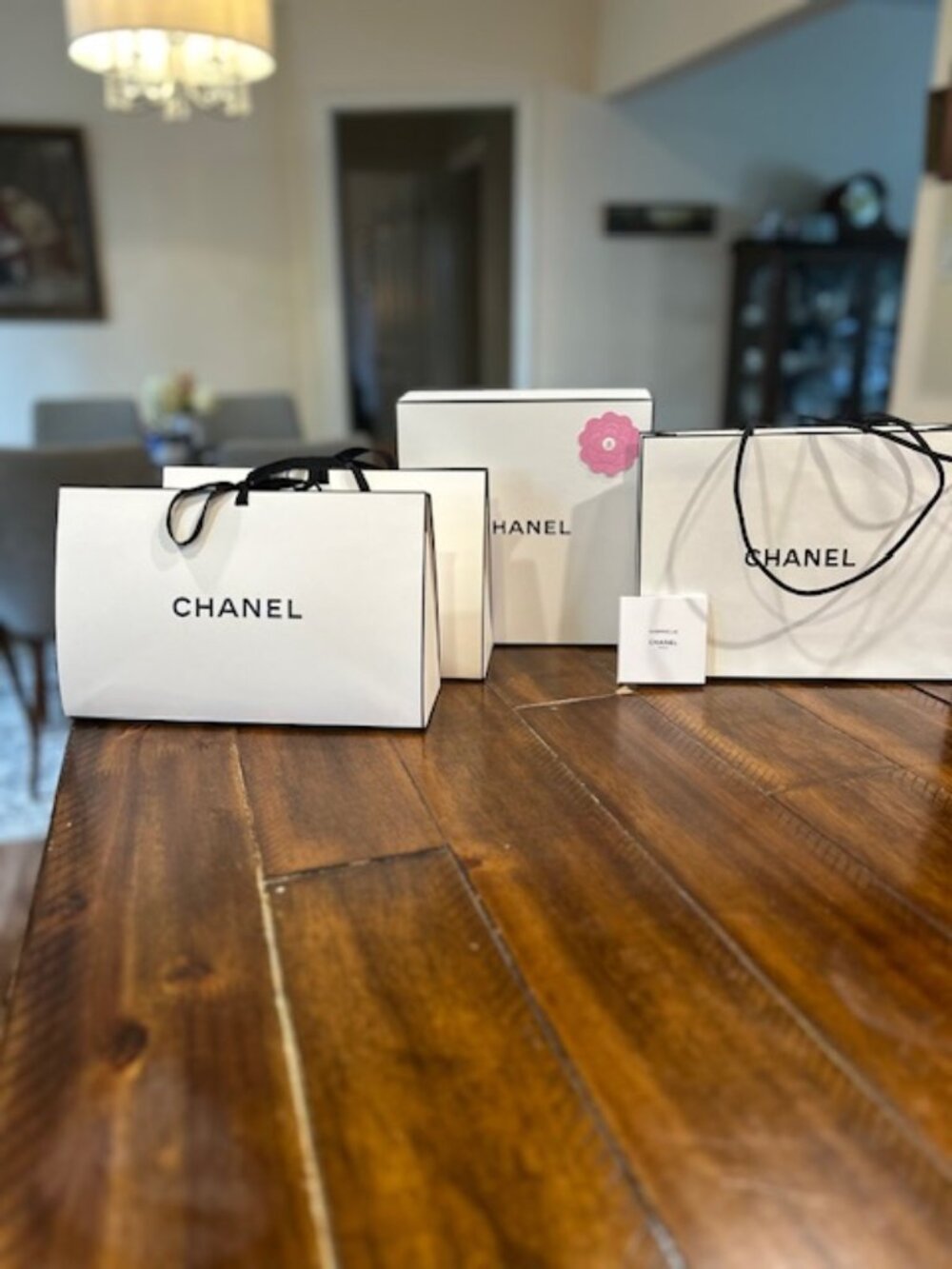 Authentic Chanel gift bags, box and charm